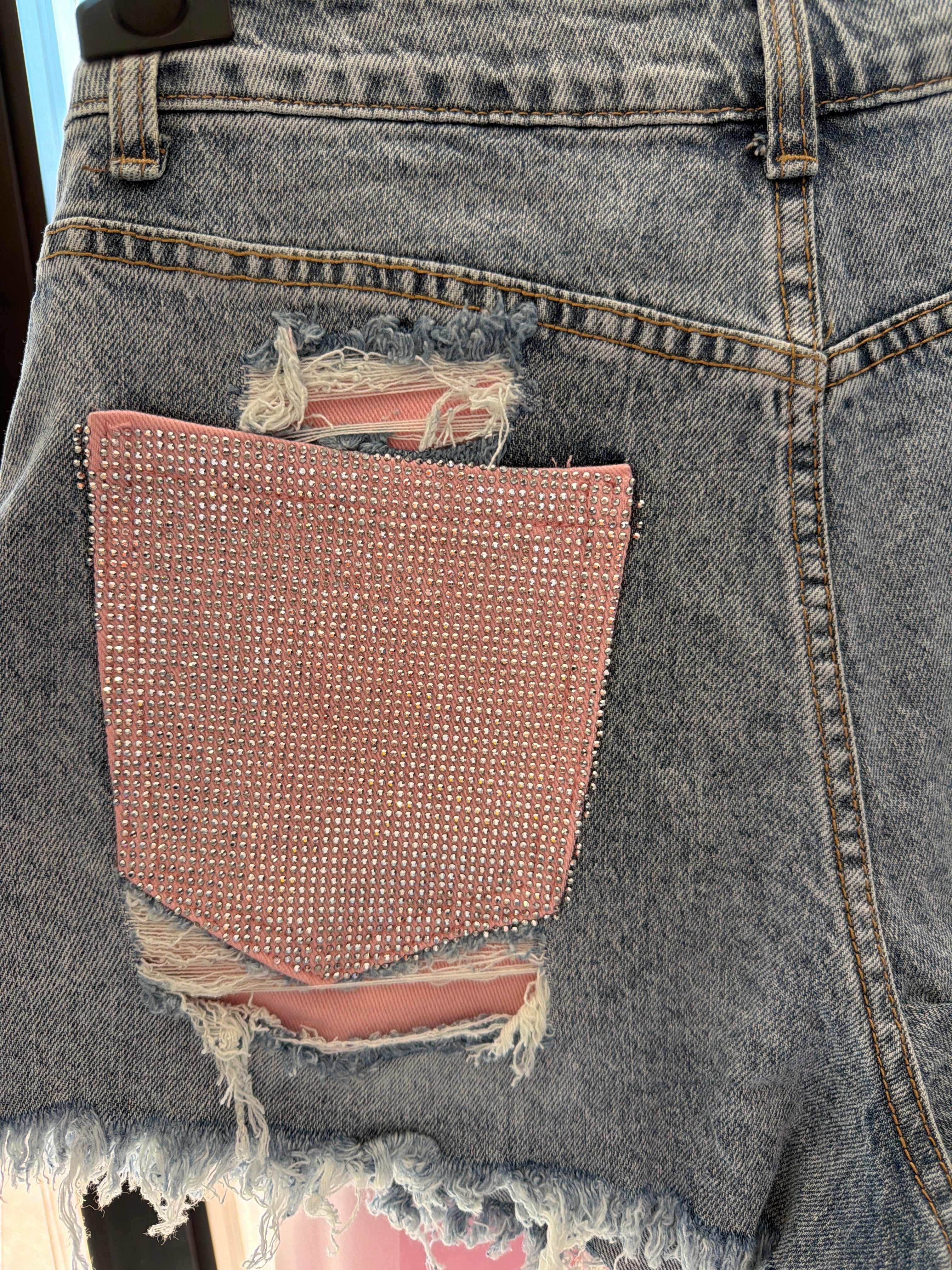 Shorts tasca rosa