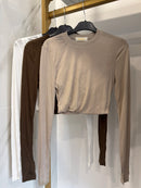 Maglia crop con manicotti ￼